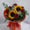 Bouquet of roses, sunflowers, and foliage