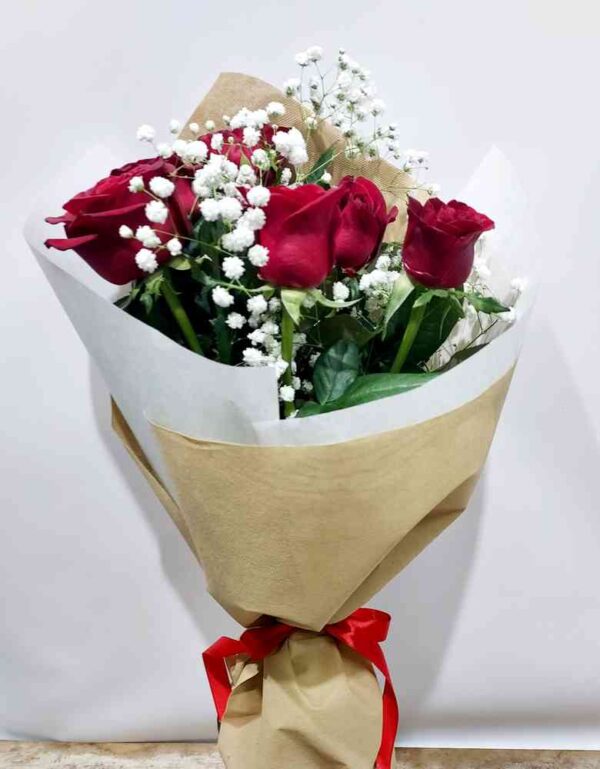 ''Ατέλειωτη έλξη'',μπουκέτο από 7 κόκκινα τριαντάφυλλα