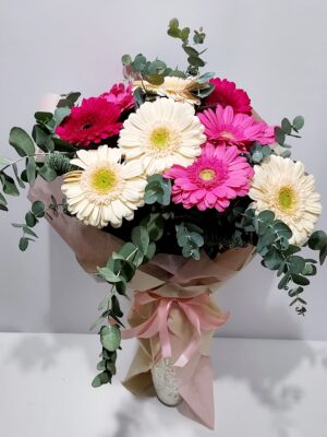 Impressive, wonderful bouquet with 12 gerberas in a variety of colors, and the wonderful eucalyptus leaves for every occasion