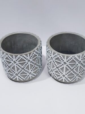 Modern gray colored planter with patterns, for indoor plants