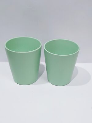 Mint colored ceramic pot for indoor plants