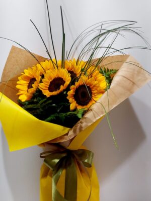 A wonderful, cheerful bouquet of 7 large sunflowers