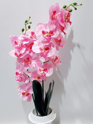 Pink fabric orchid in a plastic memorial vase