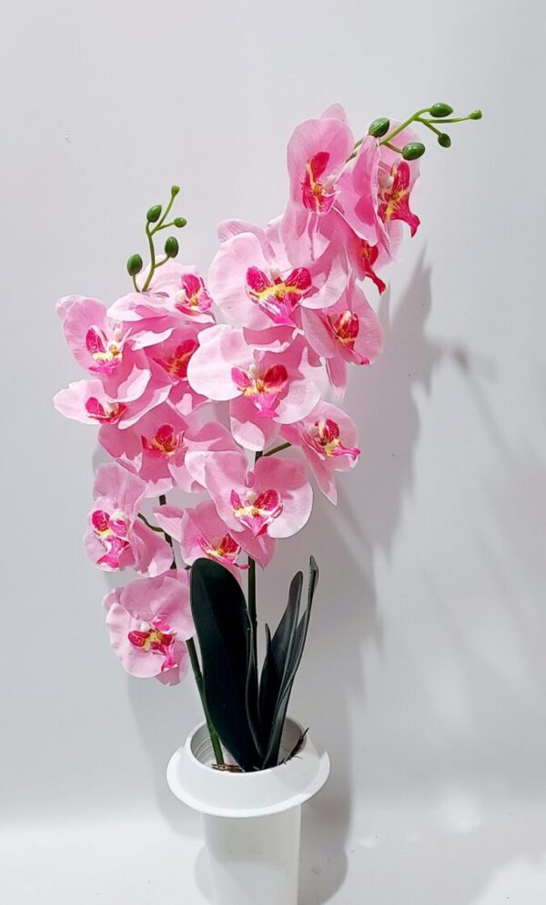 Pink fabric orchid in a plastic memorial vase