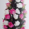 Εντυπωσιακή τεχνητή υφασμάτινη σύνθεση με απαλό ροζ τριαντάφυλλα και φοινικοειδή φύλλα 45χ30εκ.1
